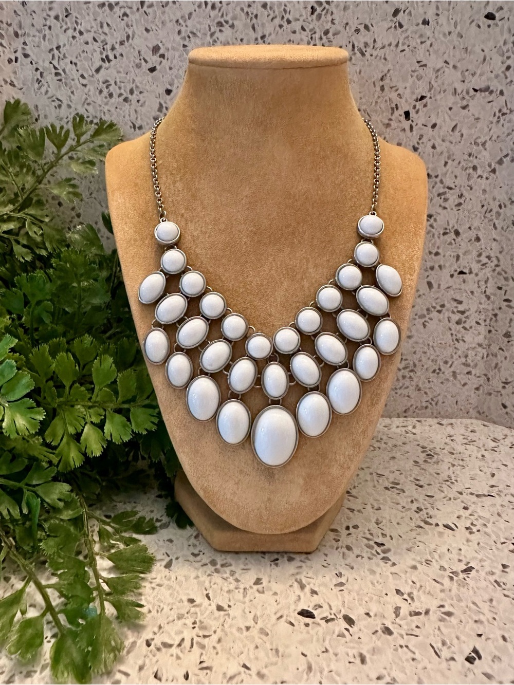 White cabochon Bib necklace in silver tone setting